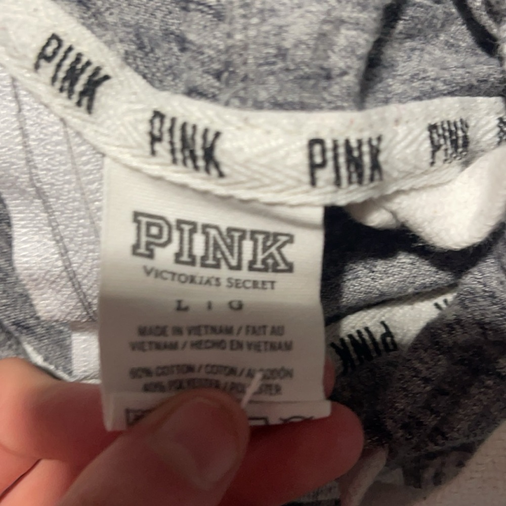 Pink brand jacket color is grey and white size L